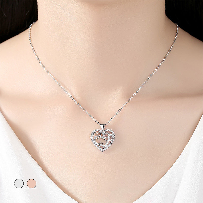 Necklace with interlocking hearts