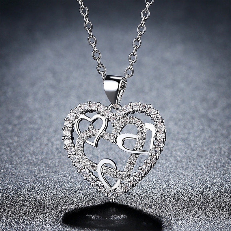 Necklace with interlocking hearts