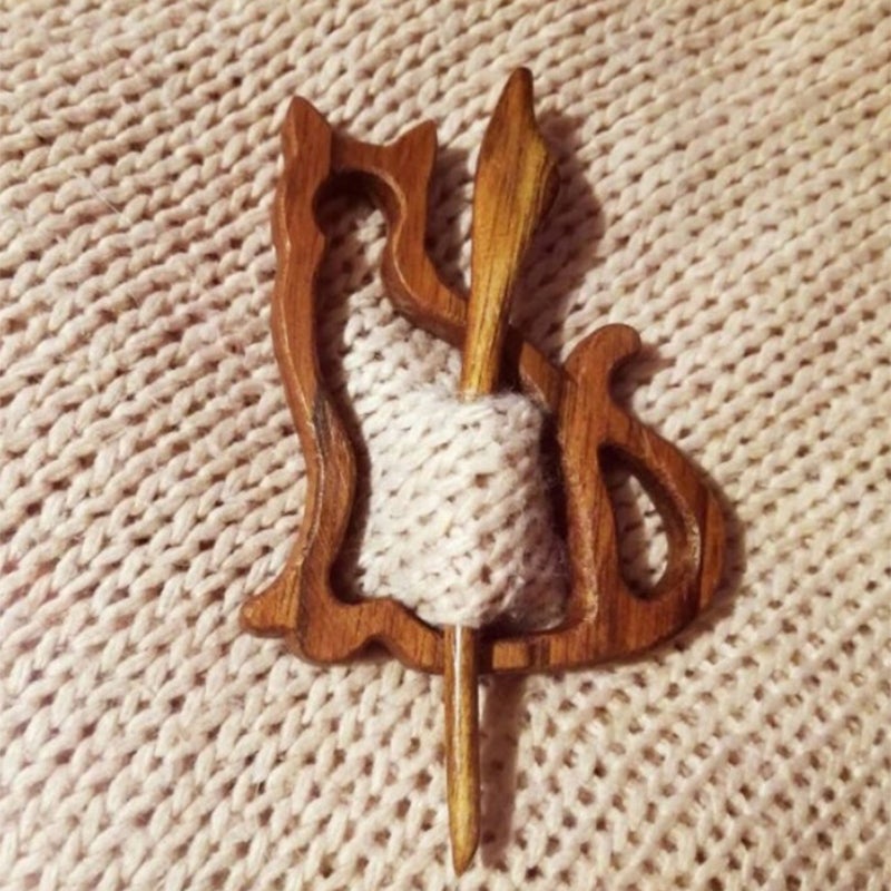 Sweet animal brooch made of wood