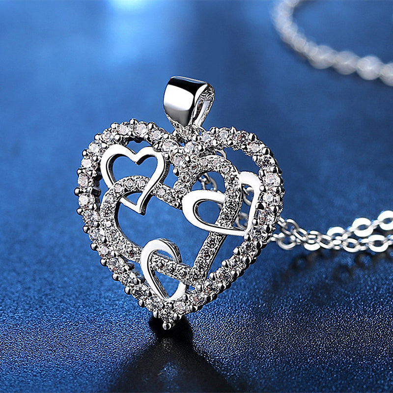 Necklace with interlocking hearts
