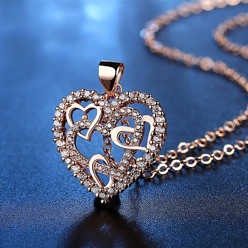 Necklace with interlocking hearts