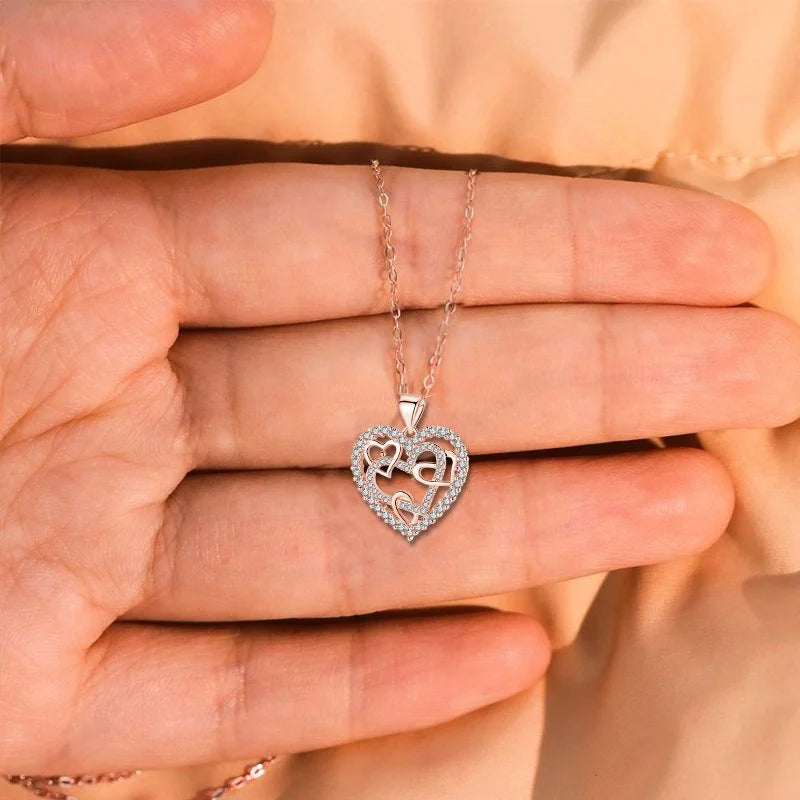 Necklace with interlocking hearts