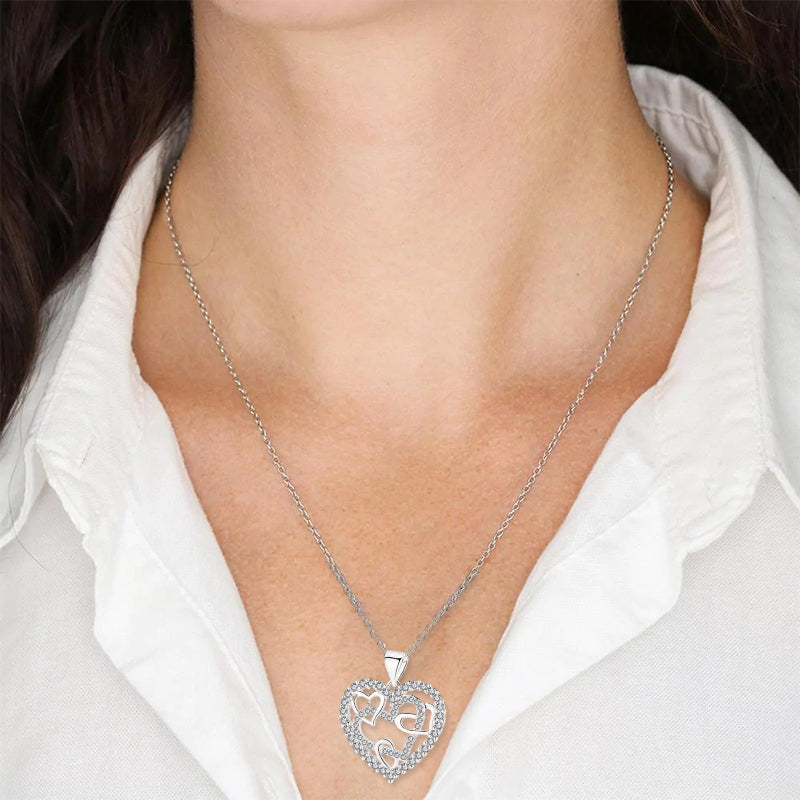 Necklace with interlocking hearts