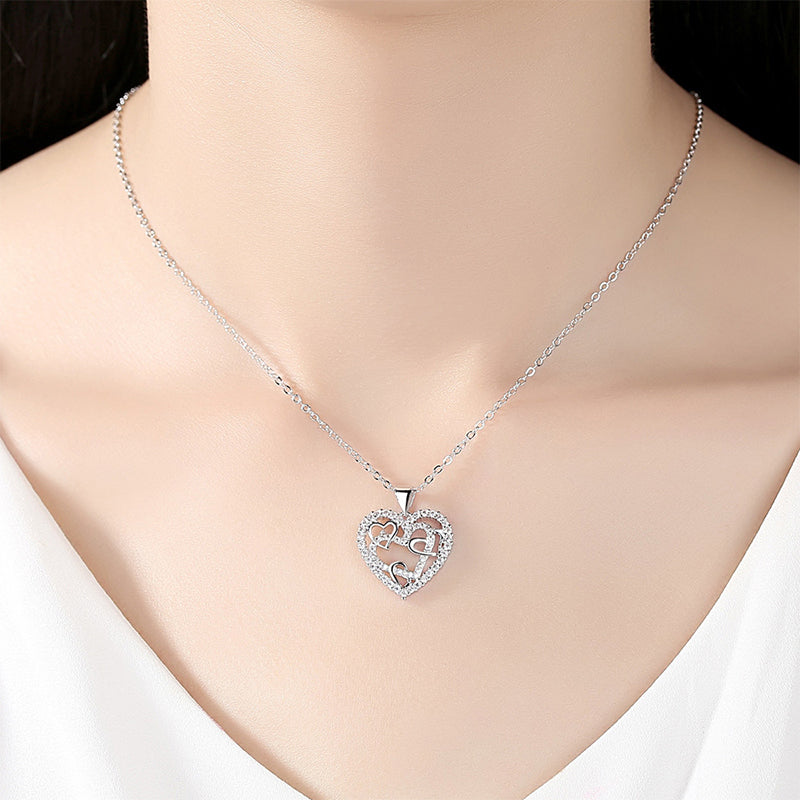 Necklace with interlocking hearts