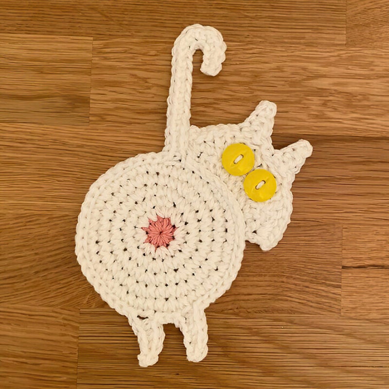 Sweet knitted kitten butt coasters