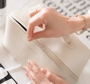 Portable travel cosmetic bag made of PU