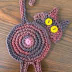 Sweet knitted kitten butt coasters