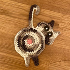 Sweet knitted kitten butt coasters