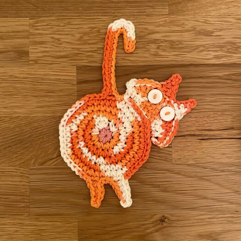 Sweet knitted kitten butt coasters