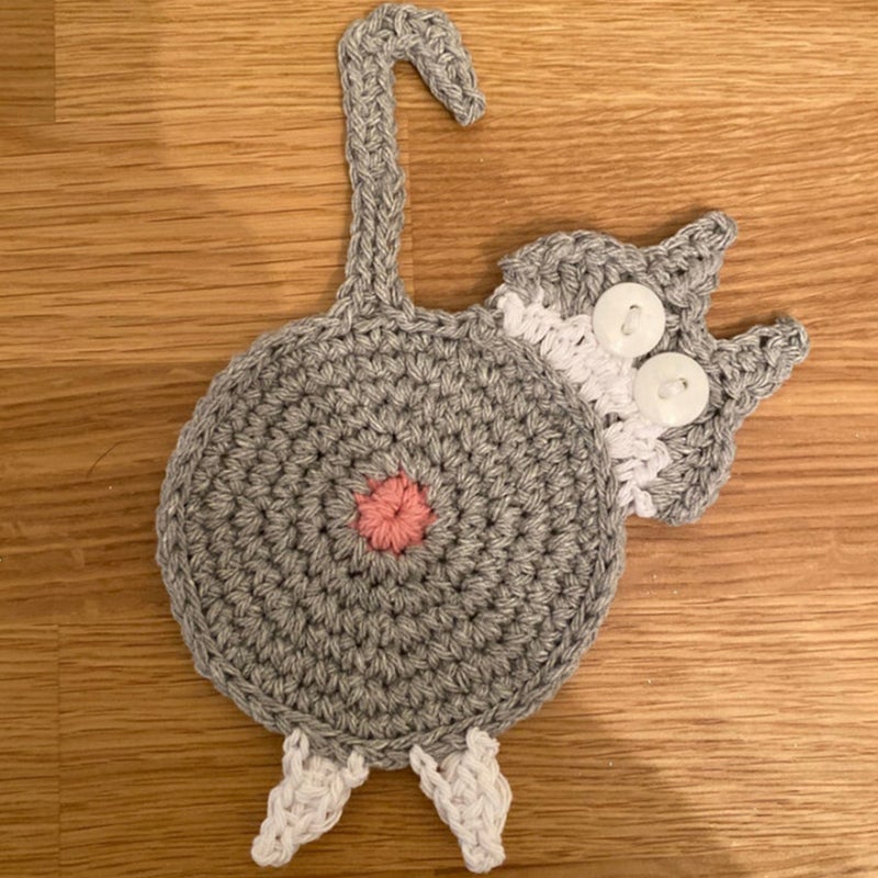 Sweet knitted kitten butt coasters