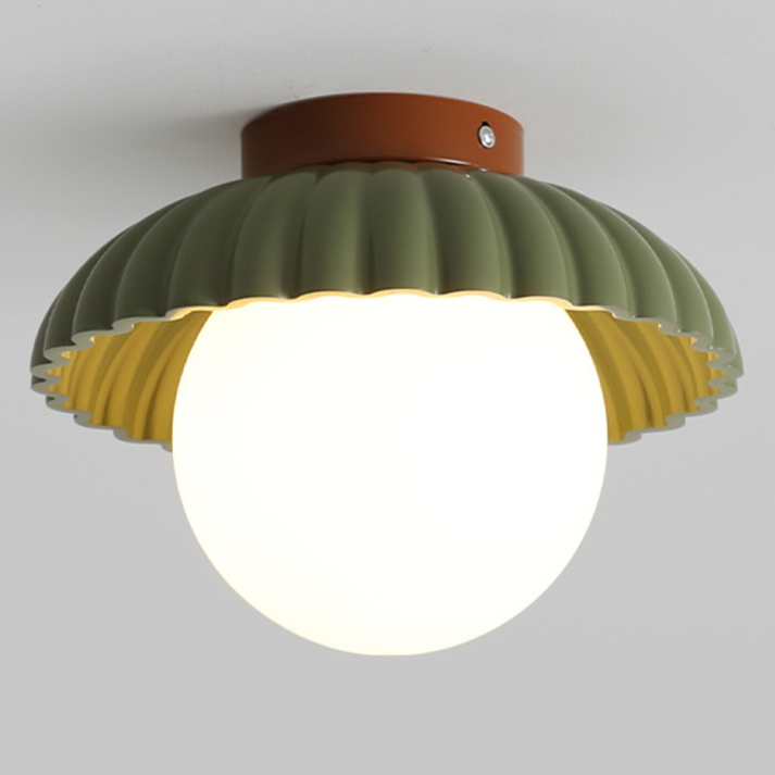 Ceiling lamp with a milk glass shade providing warm lighting in the hallway