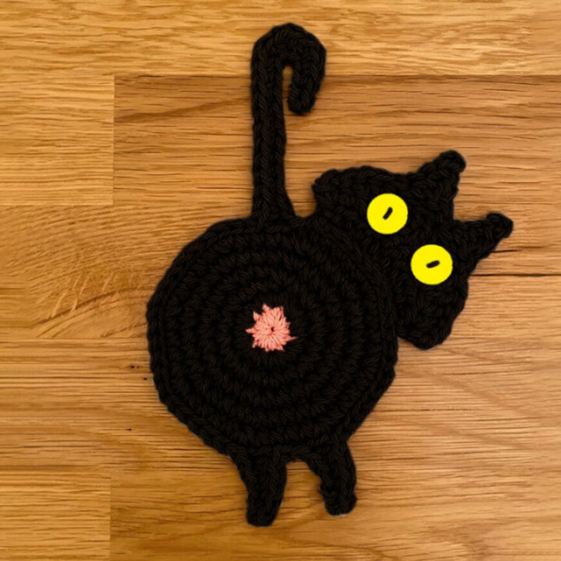 Sweet knitted kitten butt coasters