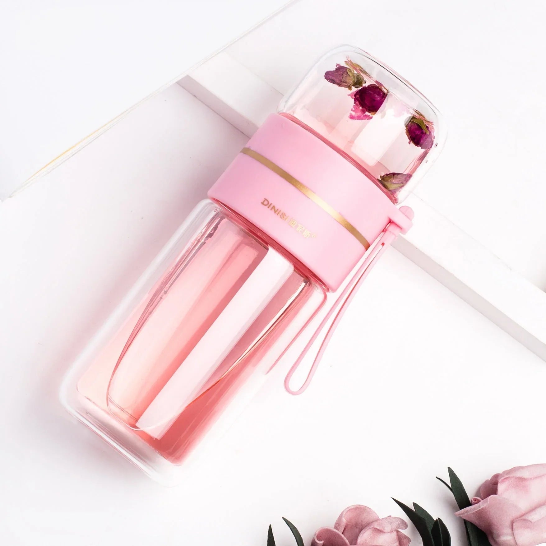 Double-walled glass bottle with tea strainer and infuser