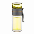 Double-walled glass bottle with tea strainer and infuser