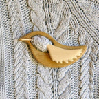 Sweet animal brooch made of wood