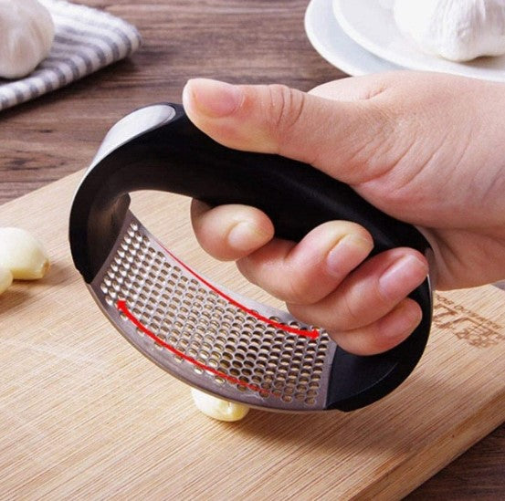 Simple manual garlic press