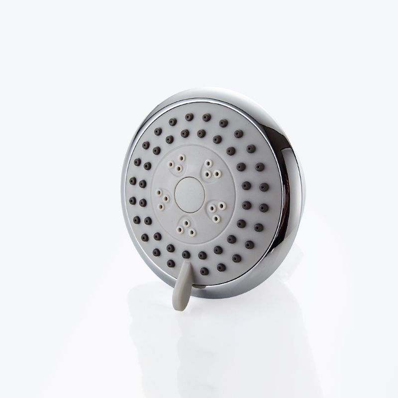 Round shower head made of stainless steel in silver wall-mounted shower head