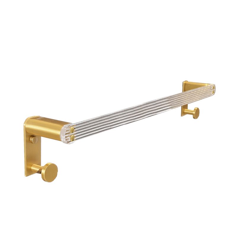 Metal and acrylic bathroom accessories as a single piece or in a set in gold