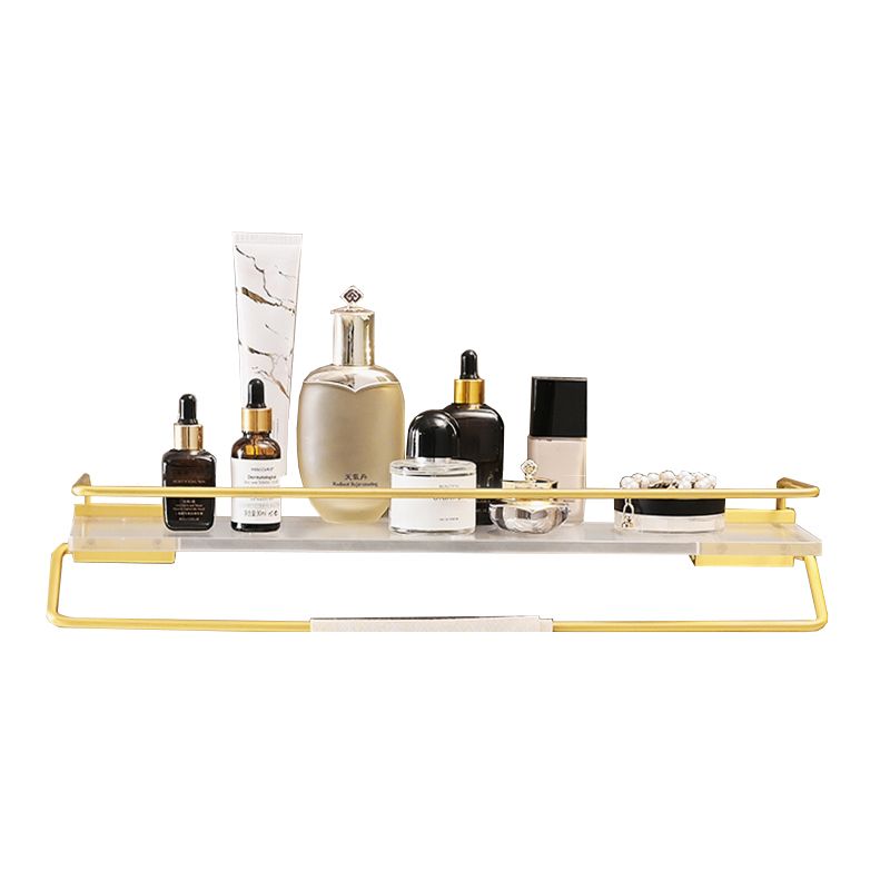 Metal and acrylic bathroom accessories as a single piece or in a set in gold
