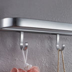 Contemporary bathroom accessory set made of aluminum with towel holder/bath shelf