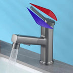 Modern bathroom sink faucet with brass lever handles and swivel spout