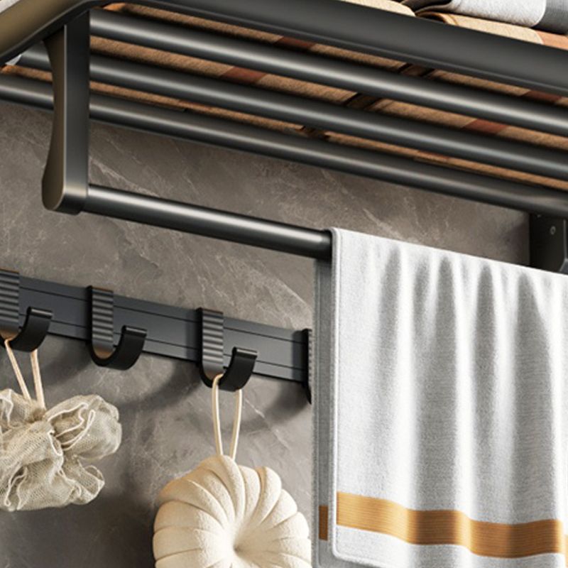 Contemporary bathroom accessory set with black finish and bath shelf/towel bar