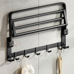 Contemporary bathroom accessory set with black finish and bath shelf/towel bar