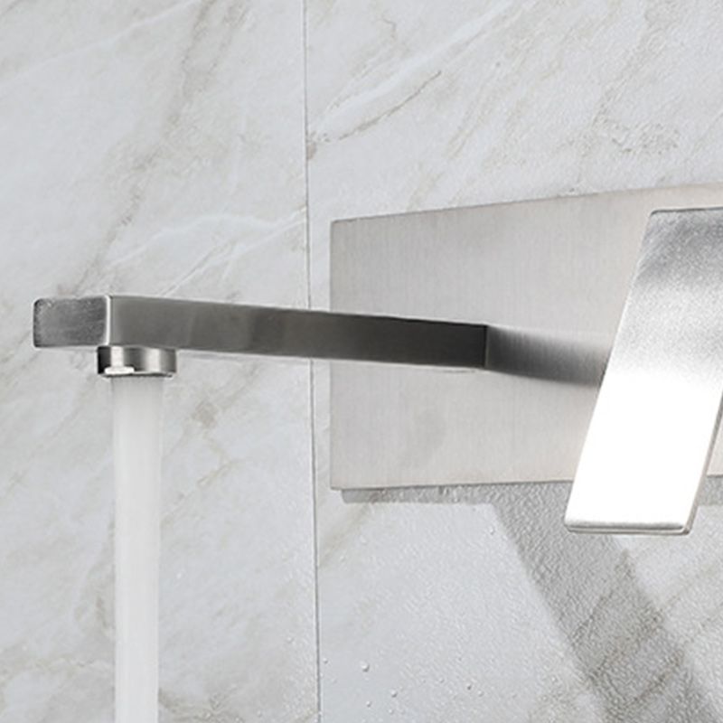 Contemporary style fittings with lever handles Wall-mounted fittings for the bathroom