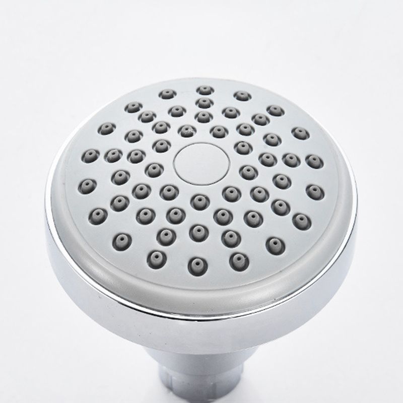 Round shower head made of stainless steel in silver wall-mounted shower head