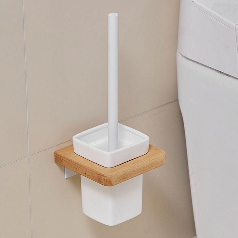 Modern natural bathroom accessories as a single piece or in a set made of solid wood
