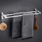 Contemporary silver metal bathroom accessory set with towel holder