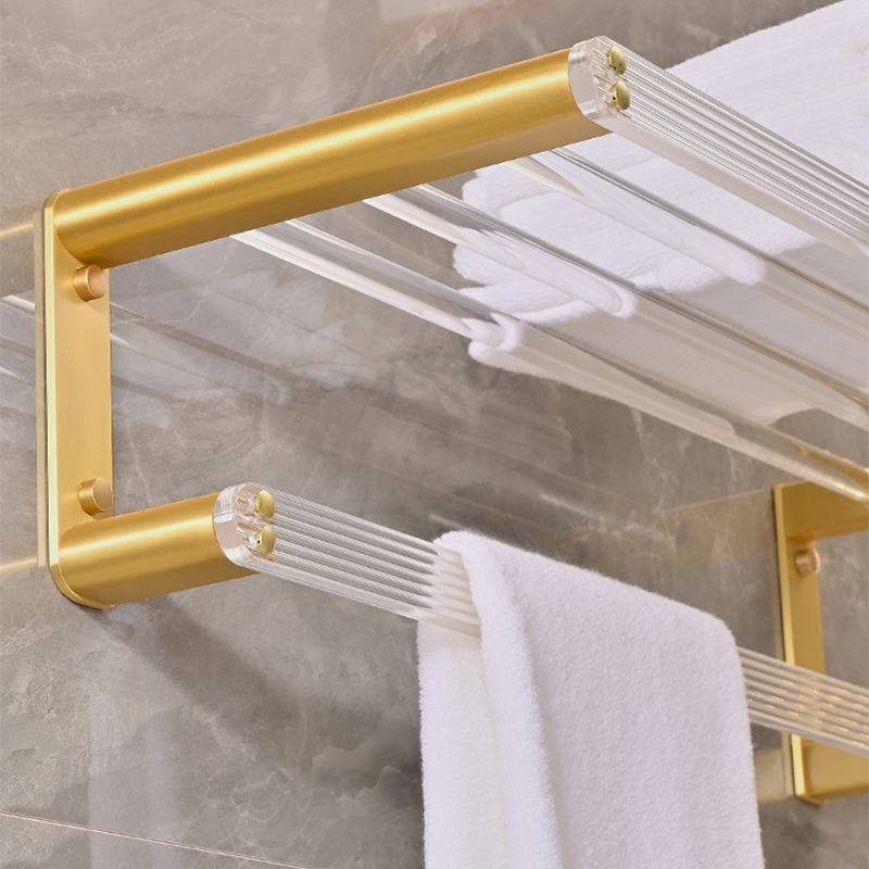Metal and acrylic bathroom accessories as a single piece or in a set in gold