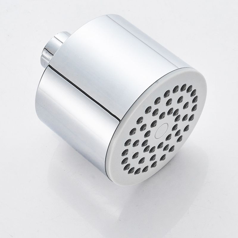 Round shower head made of stainless steel in silver wall-mounted shower head