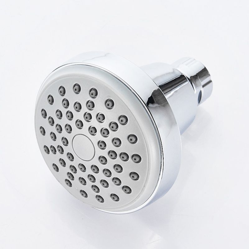 Round shower head made of stainless steel in silver wall-mounted shower head