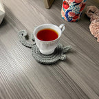 Sweet knitted kitten butt coasters