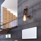 Rustic Style Pipe Wall Sconce with Valve Wheel 1 Bulb Wrought Iron Wall Mounted Light in Bronze