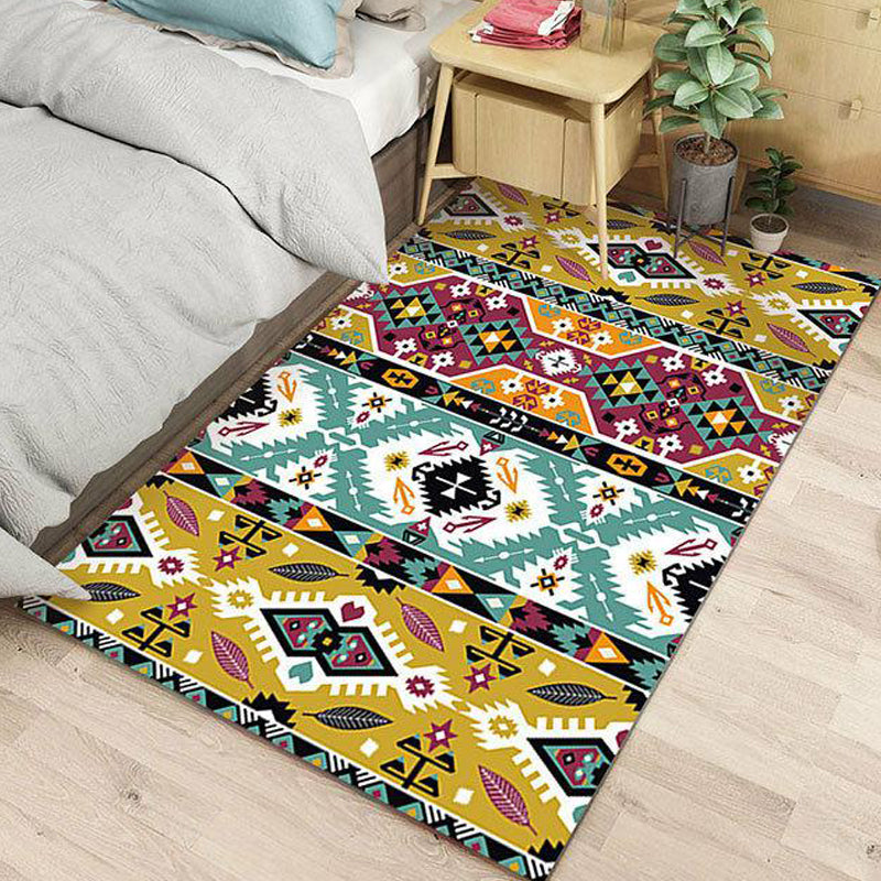 Striped geometric Indian tribal rug with botanical motifs and bows, polyester stain-resistant rug in yellow and green