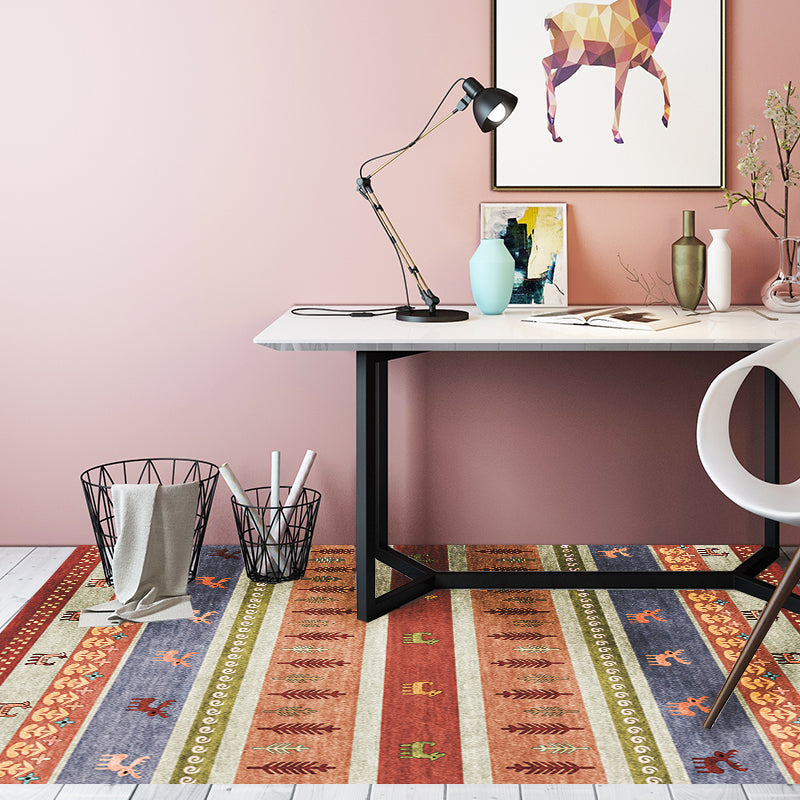 Bohemian striped geometric rug with botanical and animal motifs synthetic non-slip backing pet-friendly area rug