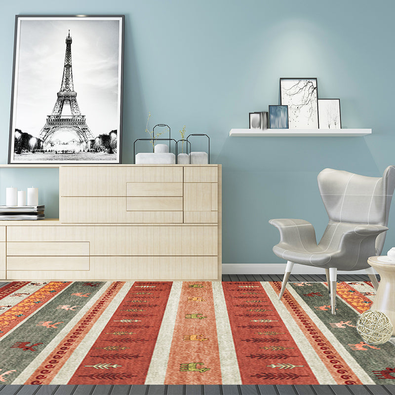 Bohemian striped geometric rug with botanical and animal motifs synthetic non-slip backing pet-friendly area rug