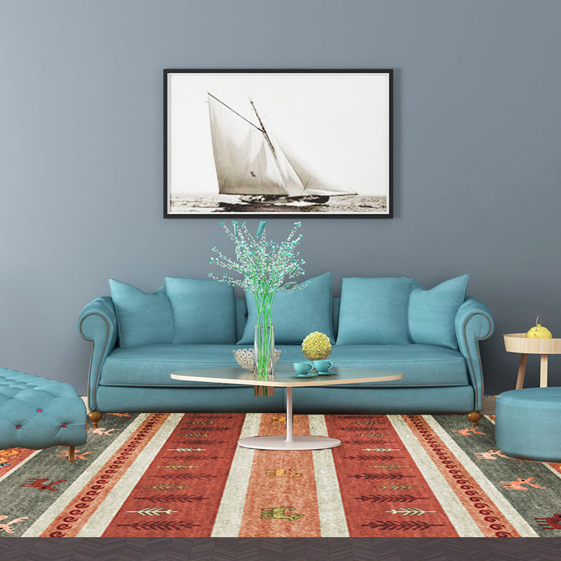 Bohemian striped geometric rug with botanical and animal motifs synthetic non-slip backing pet-friendly area rug