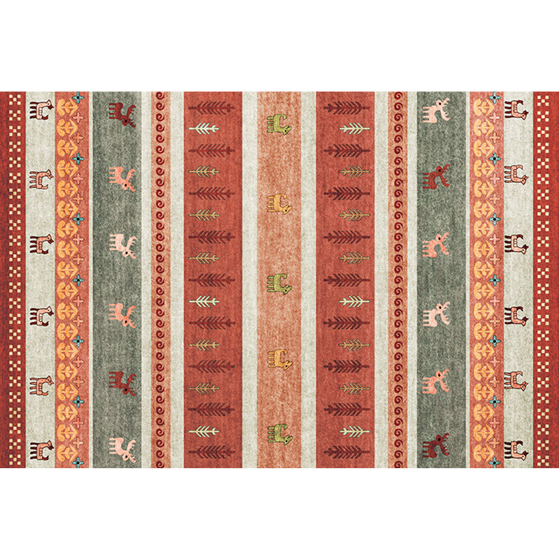 Bohemian striped geometric rug with botanical and animal motifs synthetic non-slip backing pet-friendly area rug