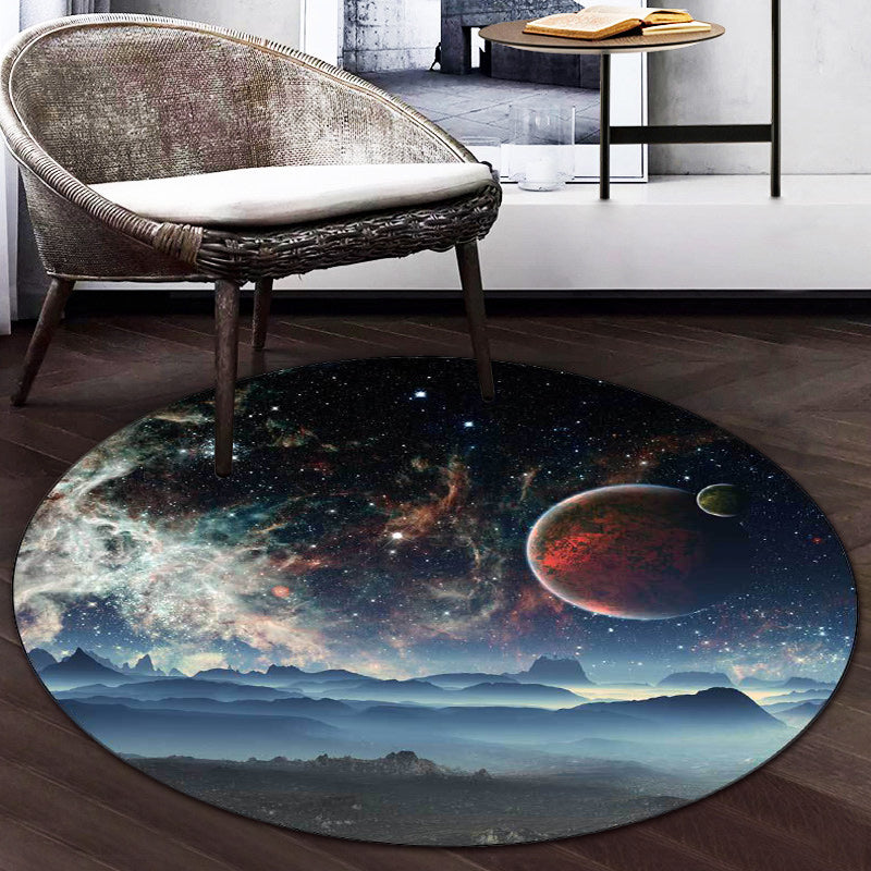 Simple modern rug in blue and black with pattern of hilly landscapes in space for home decoration, made of polyester, washable