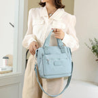 Waterproof Nylon Crossbody Bag with 7 Pockets and Adjustable Shoulder Strap