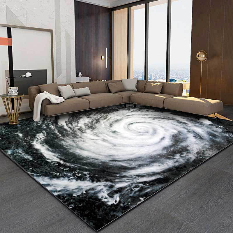 Modern living room carpet in black and white with a print of the Typhoon Eye from space, plush carpet, non-slip area rug