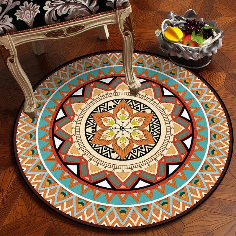 Traditional concentric circle patterned rug with floral orange tribal rug made of polyester washable non-slip backing rug for the living room