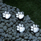 Solar lamp in paw print design – LED garden lighting in multicolor for outdoor use