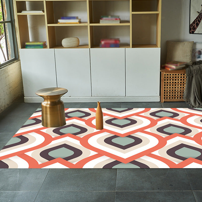 Moroccan geometric pattern rug in orange and brown, polyester rug, washable, pet-friendly, non-slip, area rug for the living room