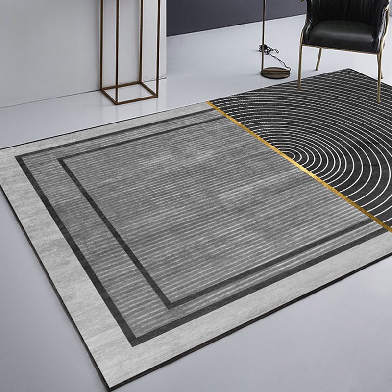 Black geometric patterned rug with stripes, modern area rug made of polyester, washable, non-slip backing rug for the study