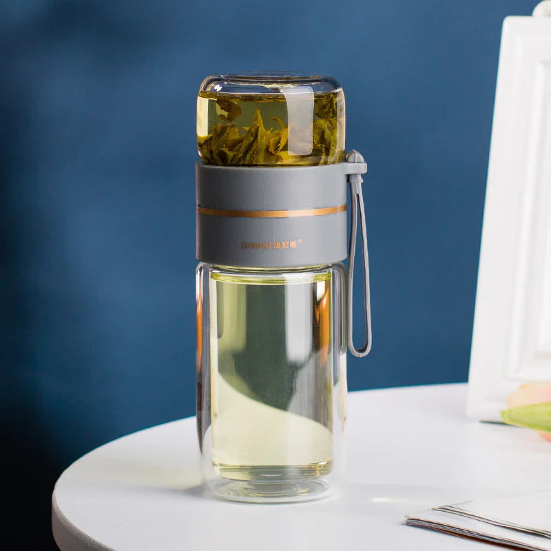 Double-walled glass bottle with tea strainer and infuser