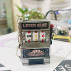 Keychain designed as a slot machine